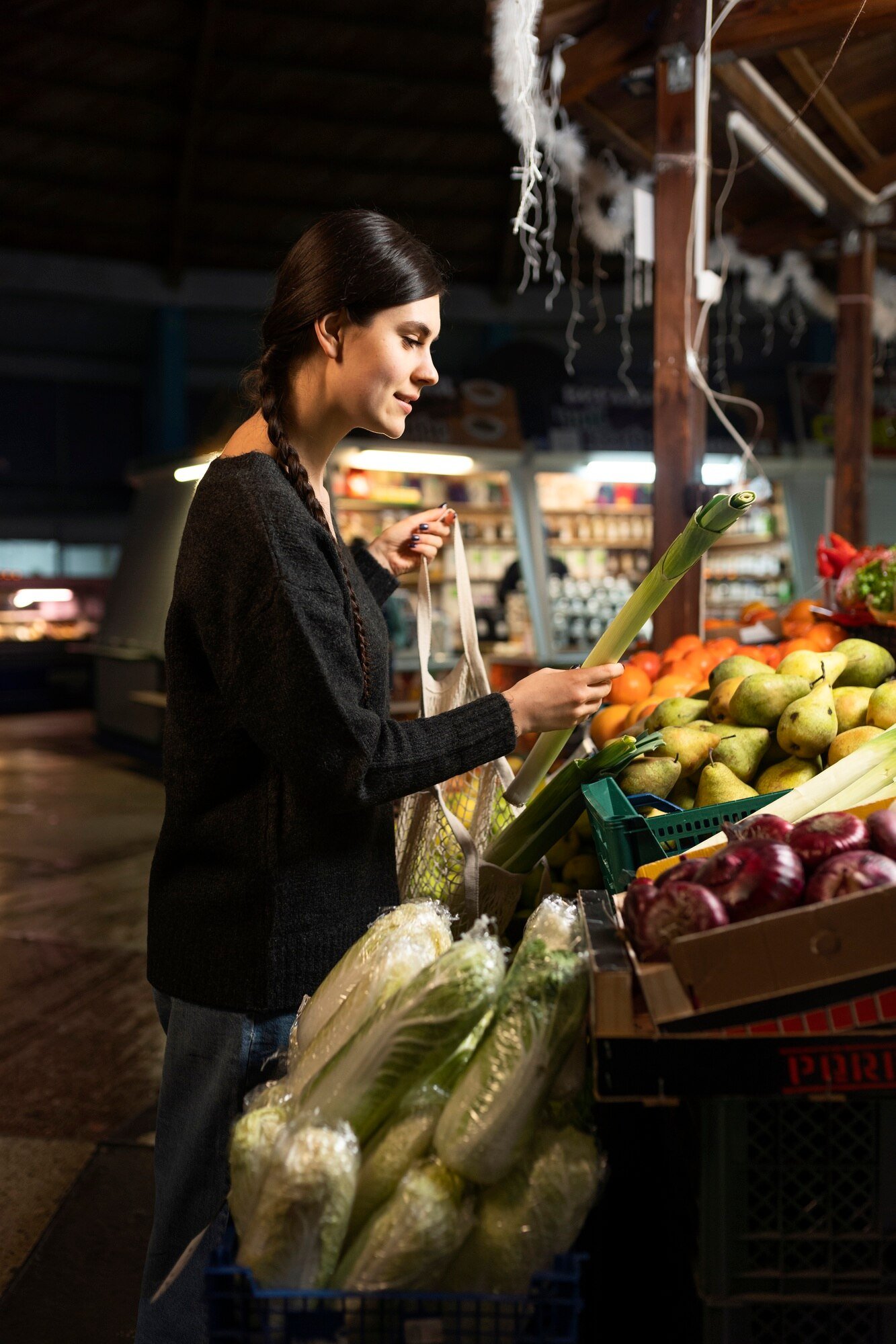 medium-shot-woman-buying-vegetables_23-2149295015