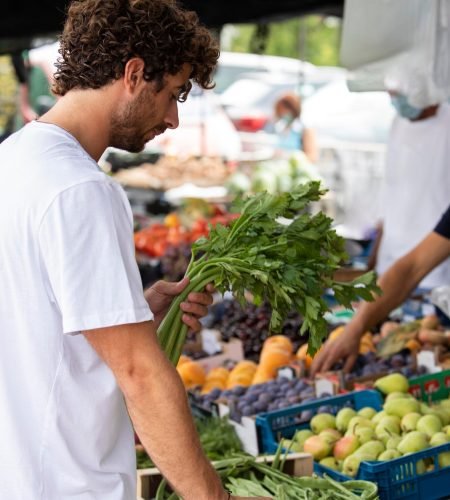 close-up-young-man-food-market_23-2149082597