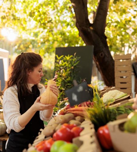 young-vendor-arranging-fresh-natural-products-farmers-market-stall-wearing-apron-preparing-local-stand-fresh-organic-fruits-veggies-outdoor-shop-selling-locally-grown-produce_482257-68701